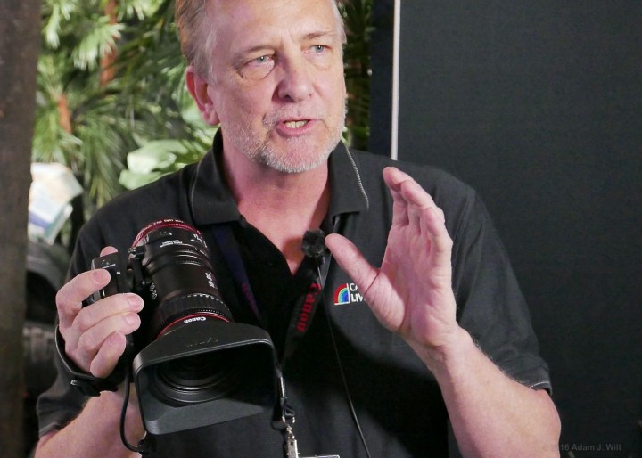 Canon's Brent Ramsey shows off the lens to the press