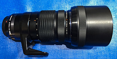 Four Olympus Micro 4/3 lens and flash-40-150-profile.jpg