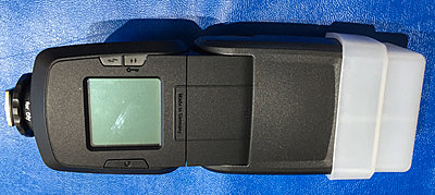 Four Olympus Micro 4/3 lens and flash-metz-back.jpg