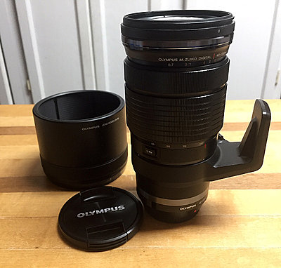 3 m43 lenses, 25mm f1.4, 40-150mm f2.8, and 60mm f2.8 macro-40-150-all-parts.jpg