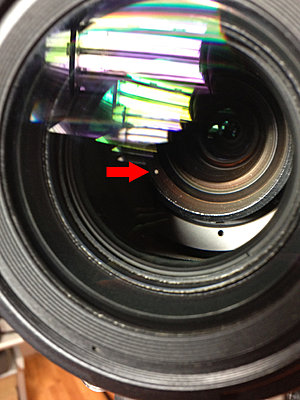 How do I clean internal lens element on EX1.  Sony Service sent back a drity lens.-ex1_spot.jpg