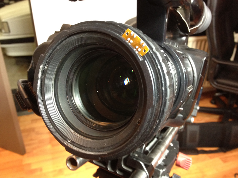How do I clean internal lens element on EX1. Sony Service